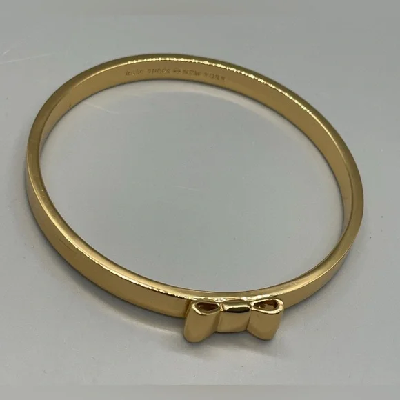KATE SPADE TAKE A BOW GOLD TONE METAL BANGLE BRACELET Feminine Dressy Dainty - Picture 3 of 7